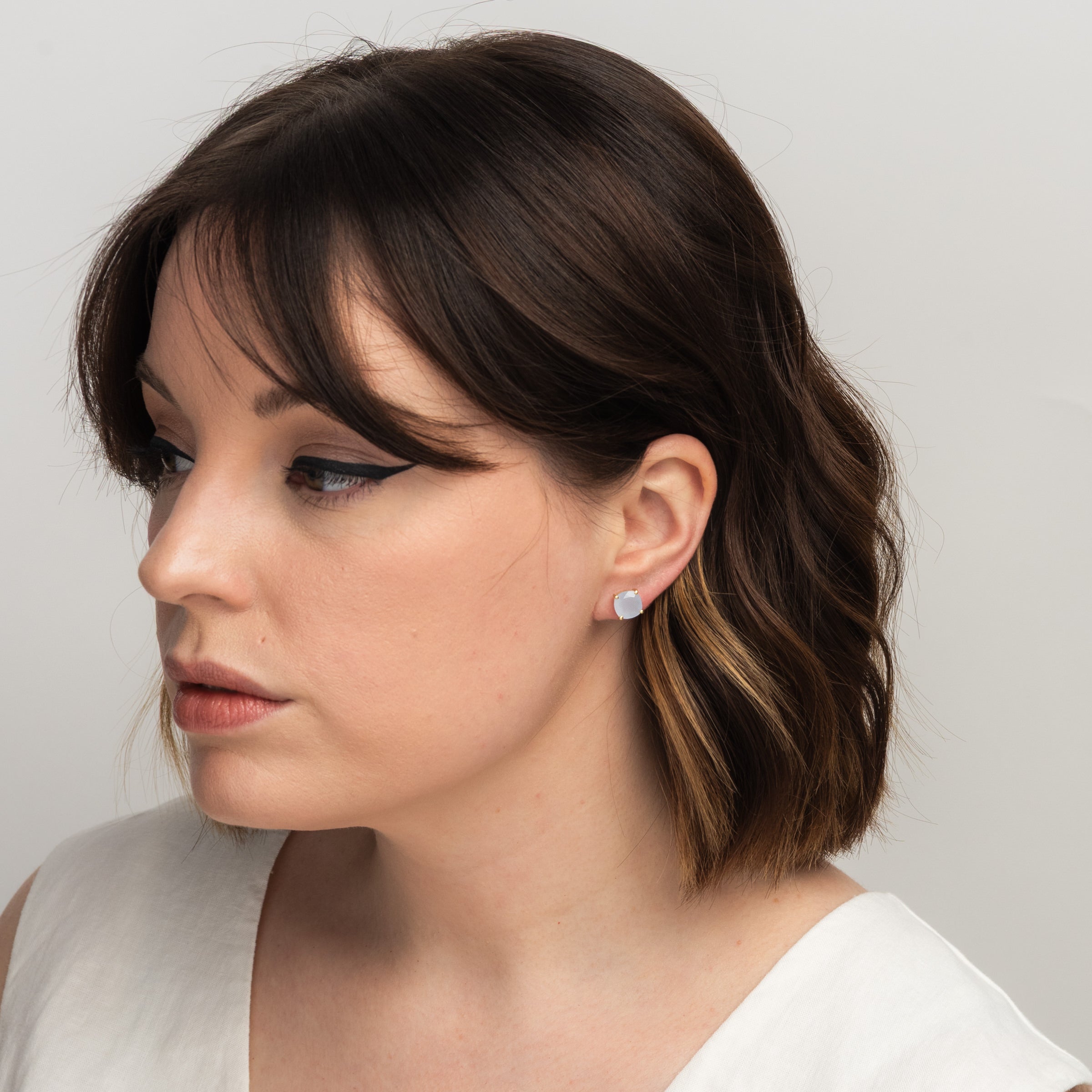 Emmy Studs in Blue Chalcedony on a model at Addison West