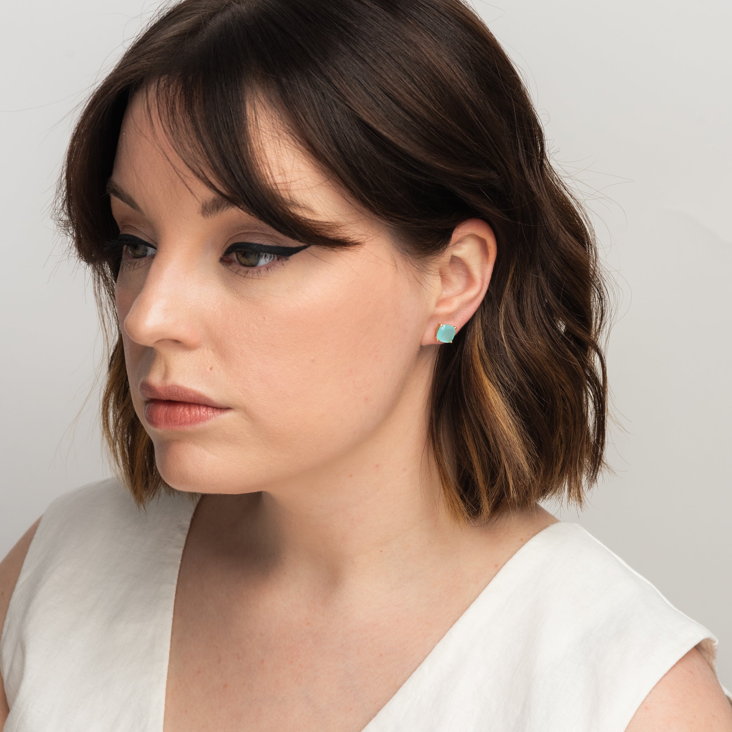 Emmy Studs in Aqua Chalcedony on a model at Addison West