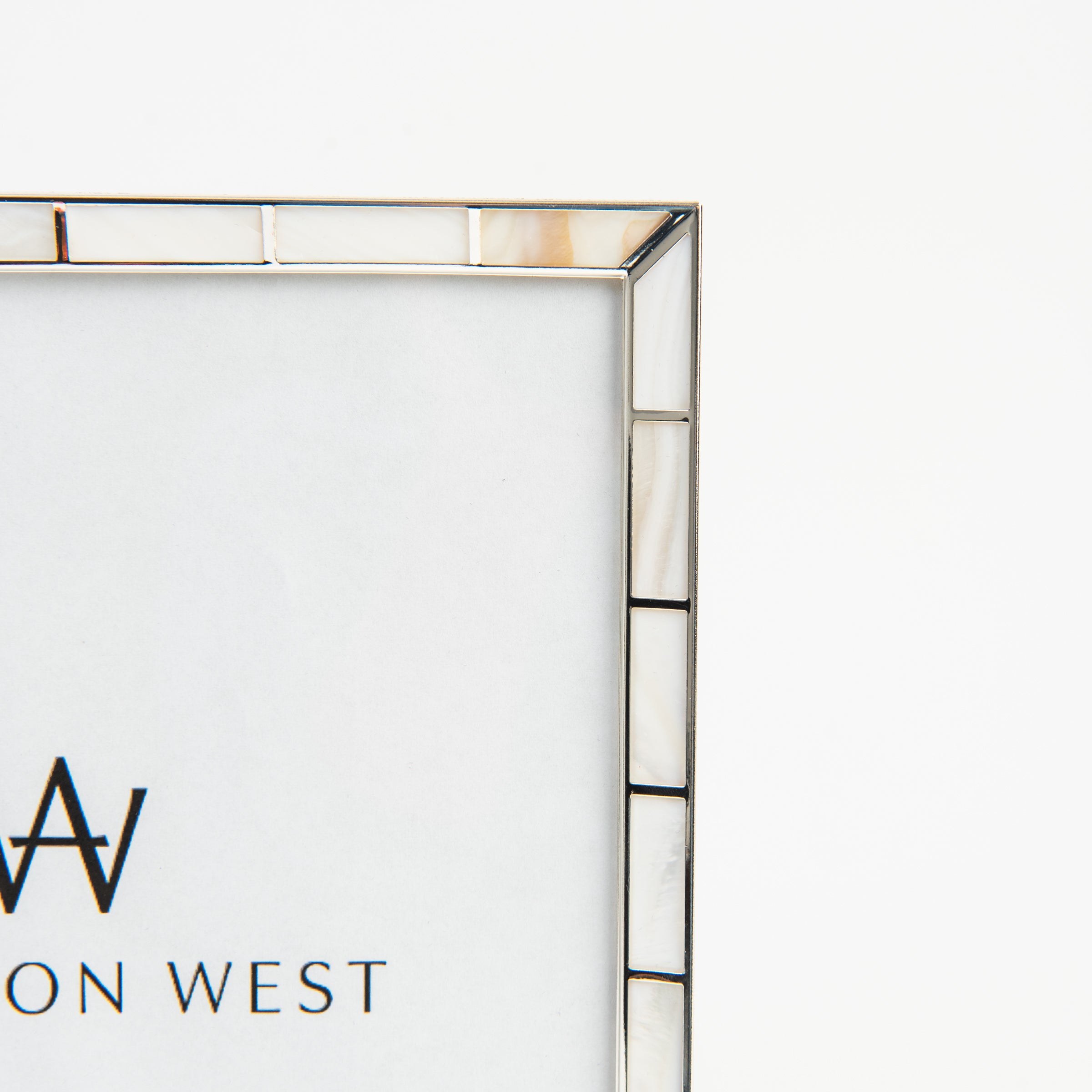 Close up of Luminous Pearl Picture Frame on a white background at Addison West