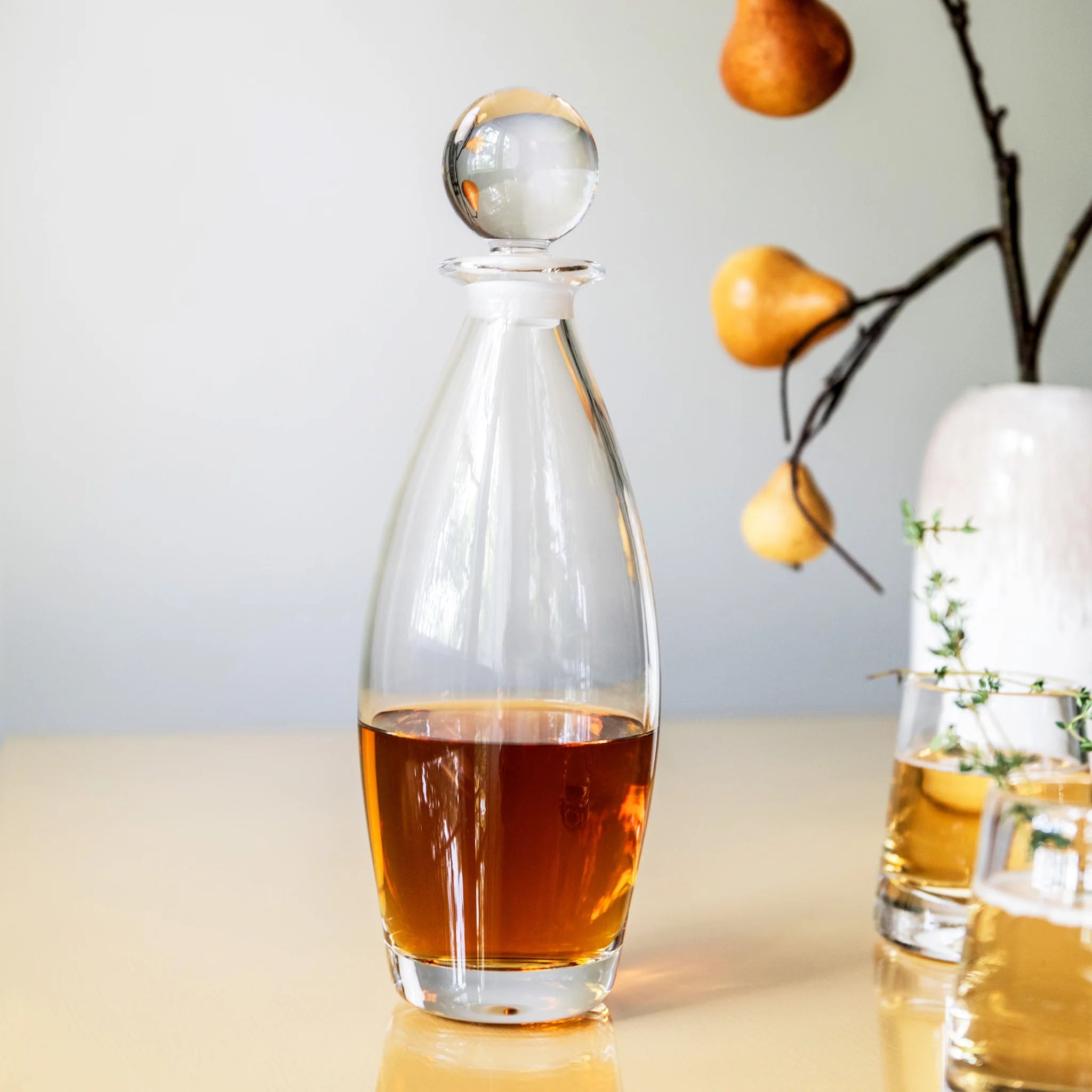 Addison Decanter on a wood table at Addison West