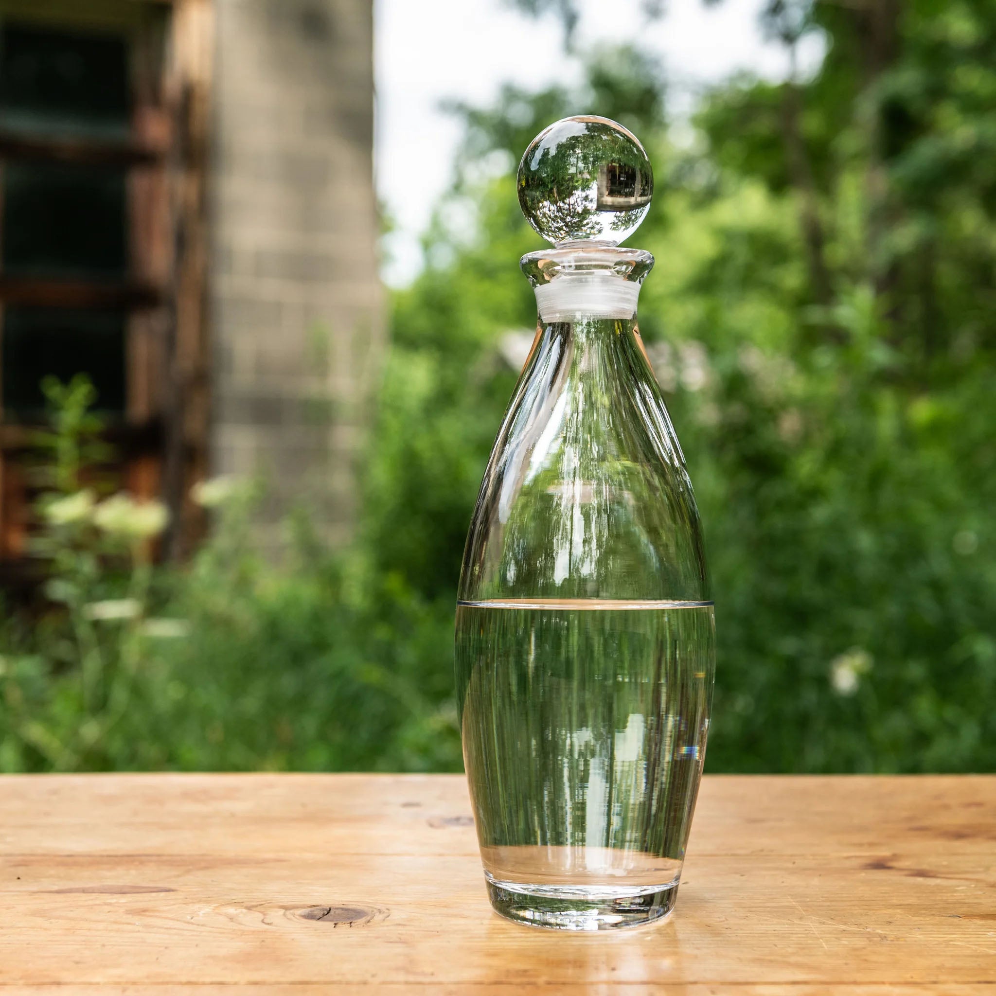 Addison Decanter on a wood table at Addison West