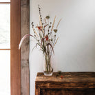 Addison Vase on a wood table at Addison West