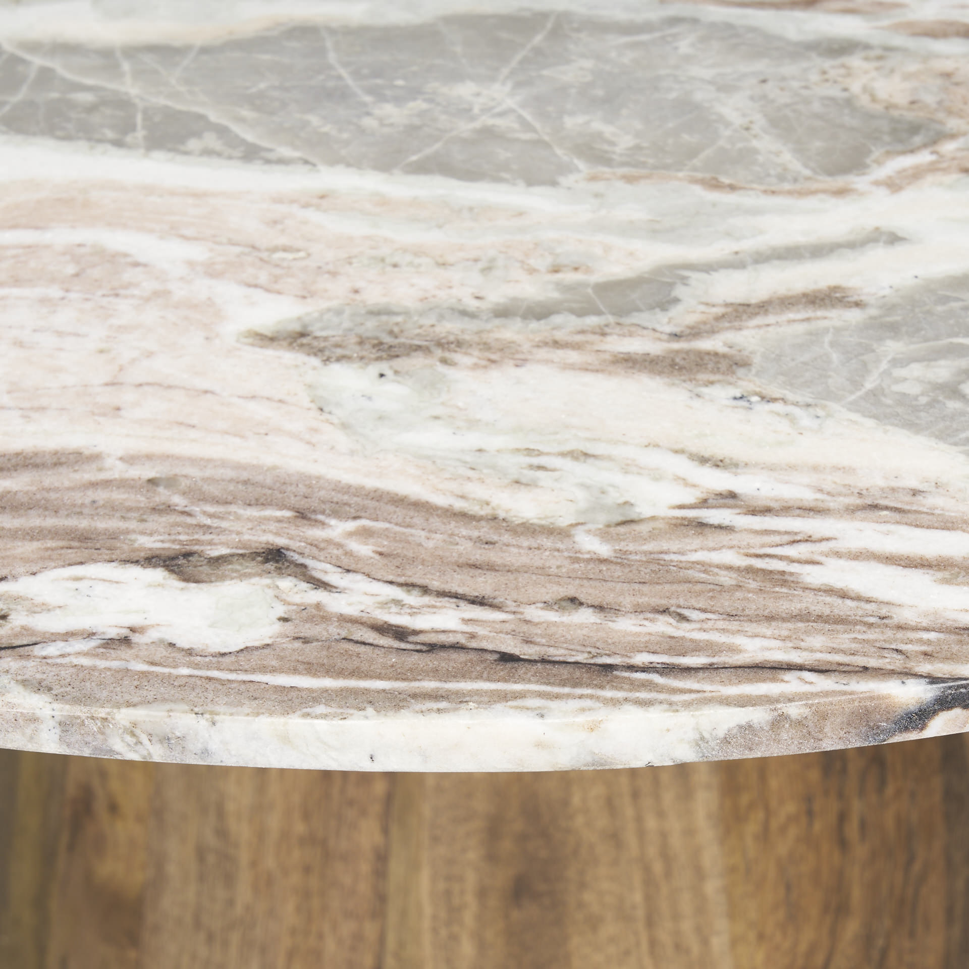 Close up of Allyson Round Medium Brown w/ Pink Marble Pedestal Dining Table