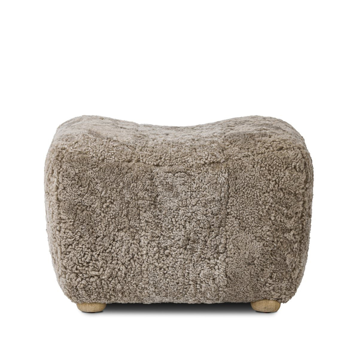 Amber Lewis x Four Hands Oslo Ottoman in Taupe Shearling on a white background at Addison West