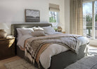 Amber Lewis x Four Hands Poppy Nightstand in Saddle Brown in a neutral bedroom at Addison West