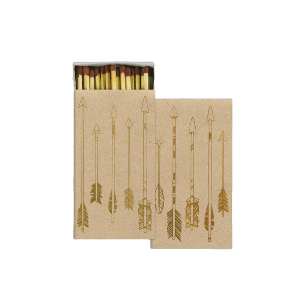 Tan Box of matches with four gold arrows on a white background