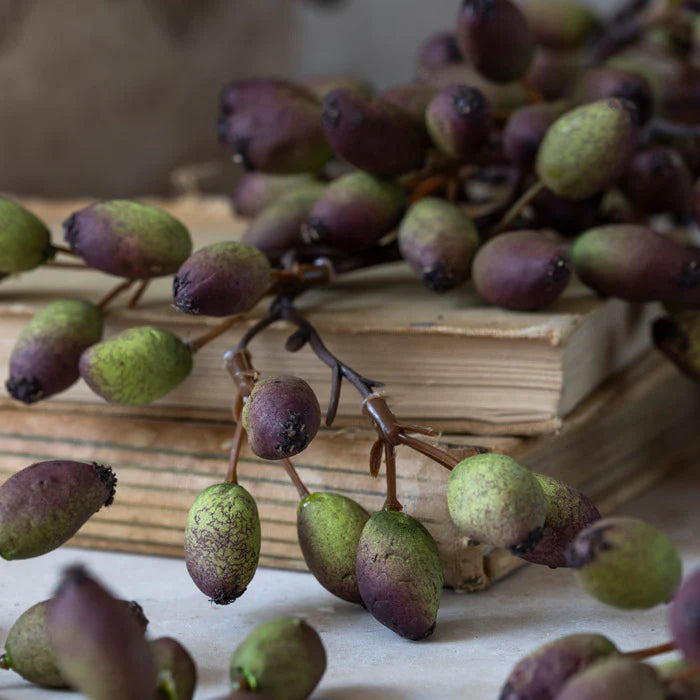Close up of Abigail Ahern Artificial Barberry on a table at Addison West