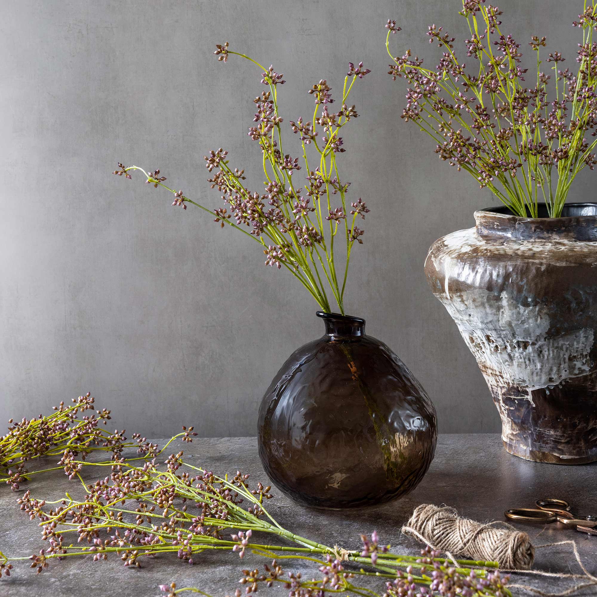 Abigail Ahern Faux Succulent Branch in Blush on a table at Addison West