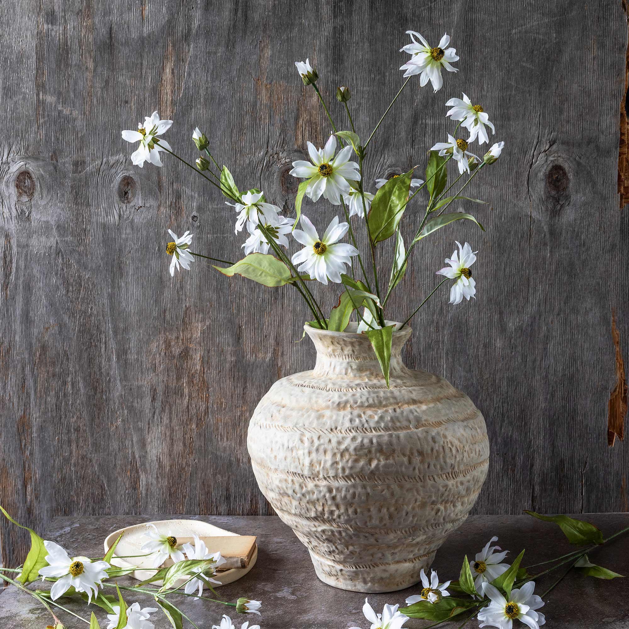 Abigail Ahern Faux Wild Cosmos in a vase on a grey background at Addison West
