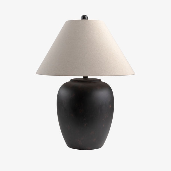 Black surya Bastille table lamp with flared white linen shade on a white background