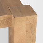 Close up of Beth Light Brown Wood Rectangular Dining Table on a white background