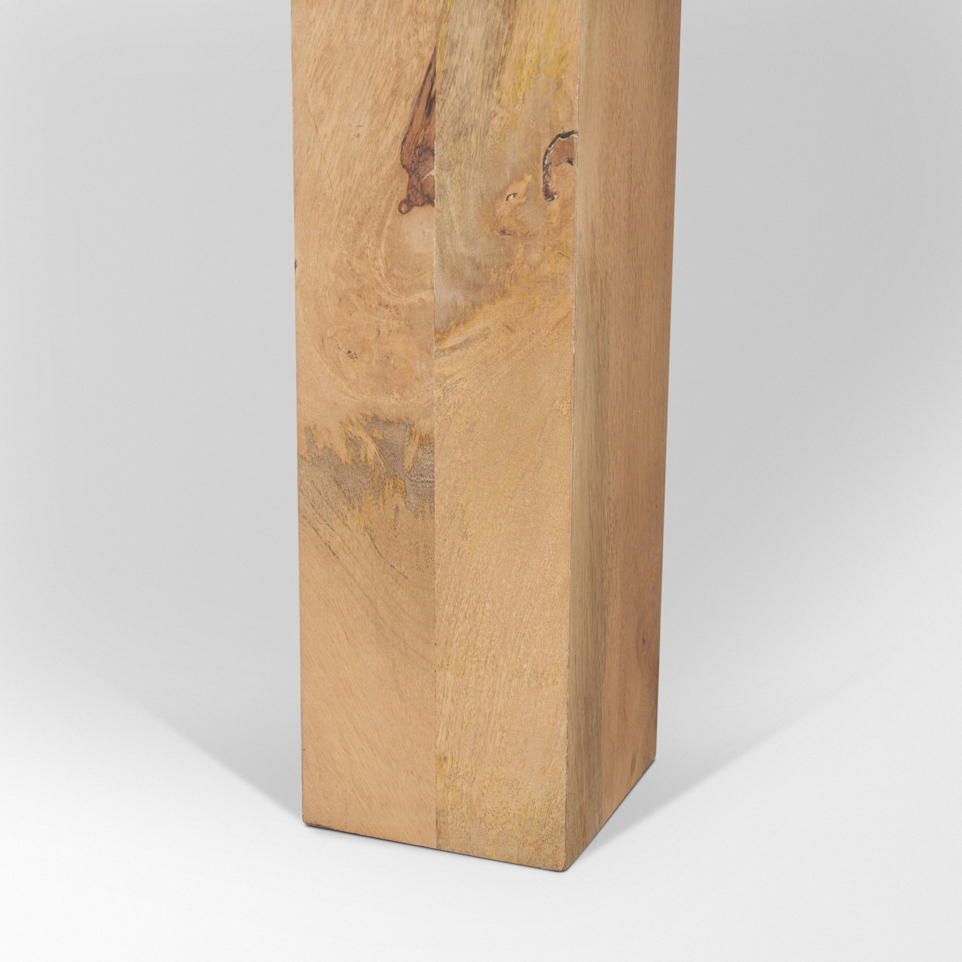 Close up of Beth Light Brown Wood Rectangular Dining Table on a white background