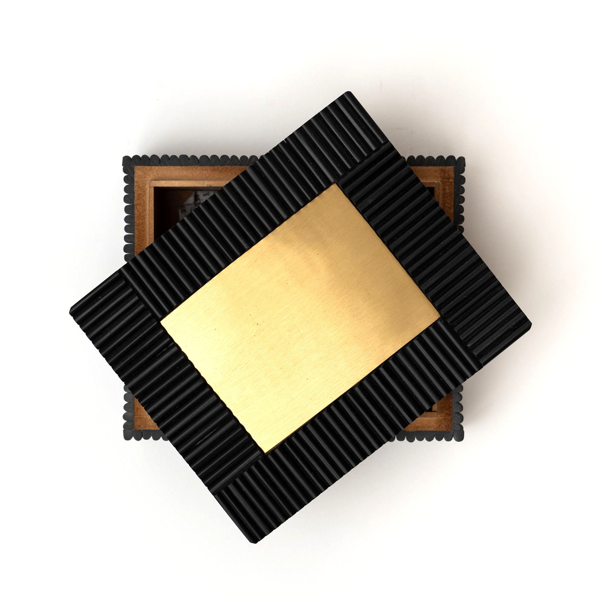 Black & Brass Box on a white background at Addison West