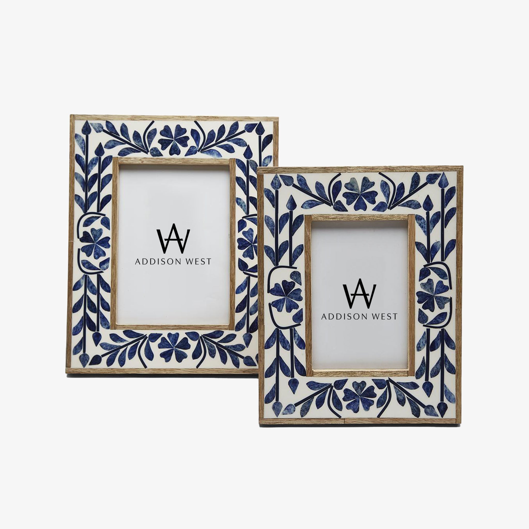Two picture frames with floral bone navy blue inlay on a white background