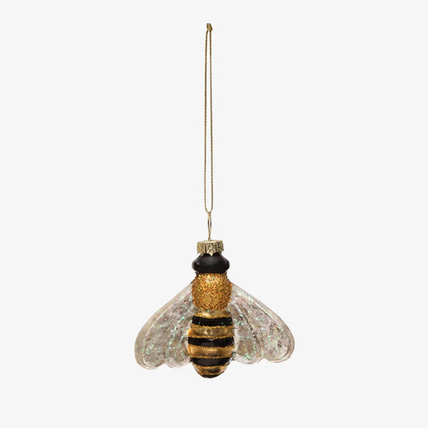 glitter bee ornament on a white background