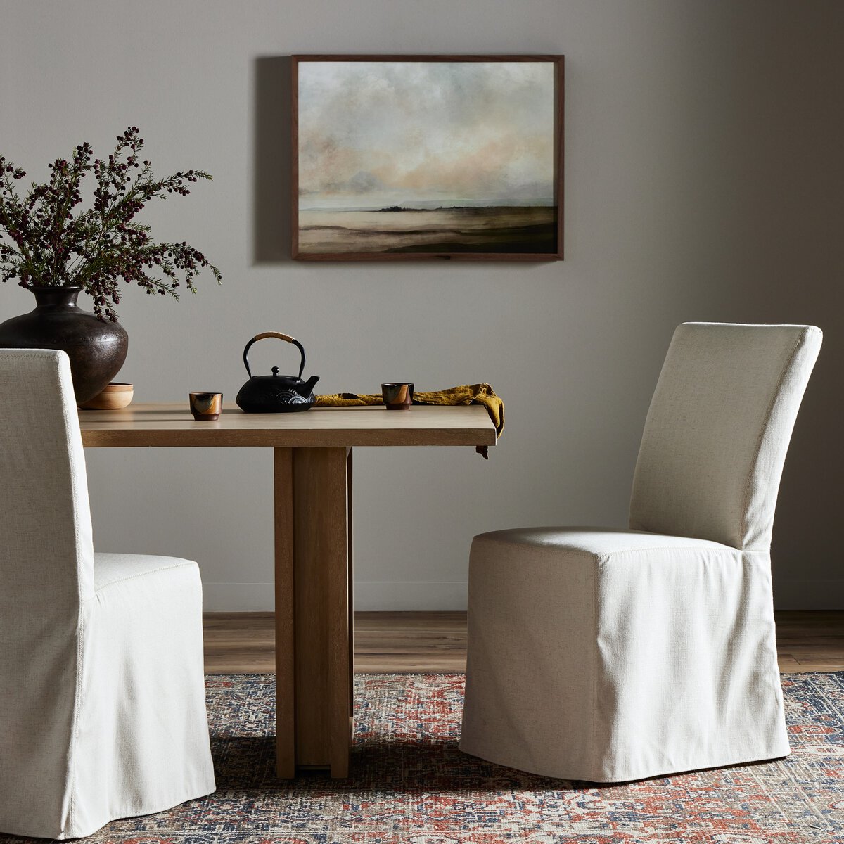 Four Hands Vista Slipcovered Dining Chair in Savile Flax in a modern dining room
