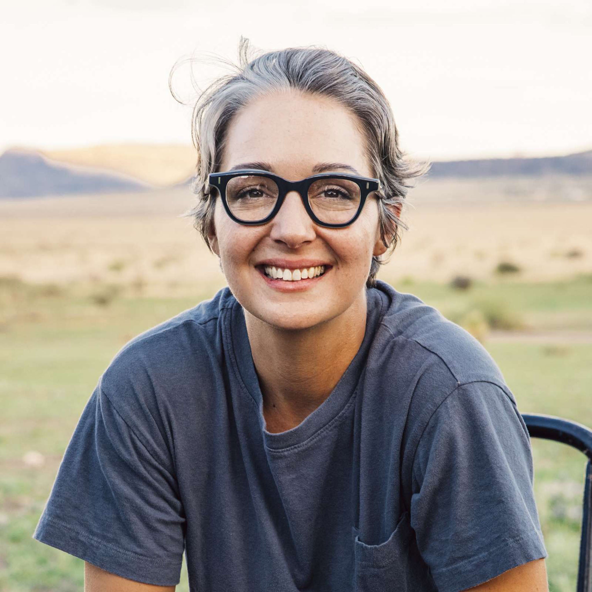 Caddis Wabi Sabi Reading Glasses on a model at Addison West