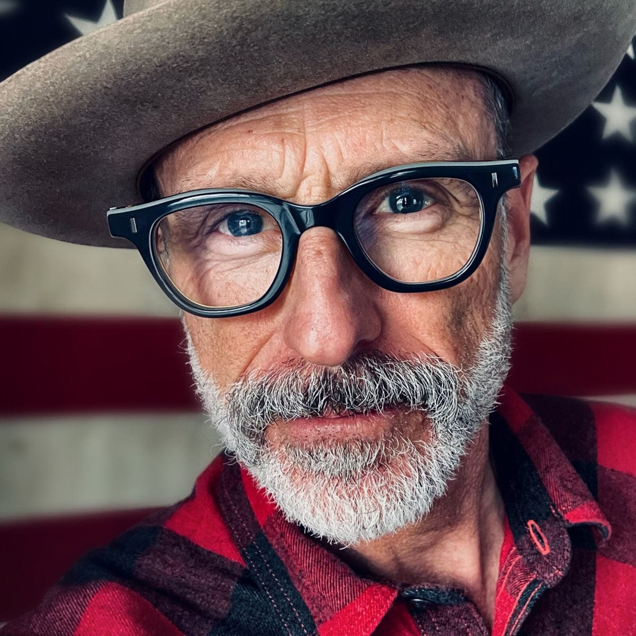 Caddis Wabi Sabi Reading Glasses on a model at Addison West