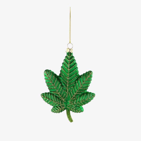 Cannabis Christmas ornament by Cody Foster on a white background