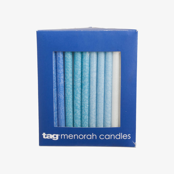 Box of 44 blue and white Chanukah candles by Tag in blue box on a white background