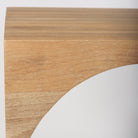 Set of two mangowood nesting tables with arch cut out on a white background