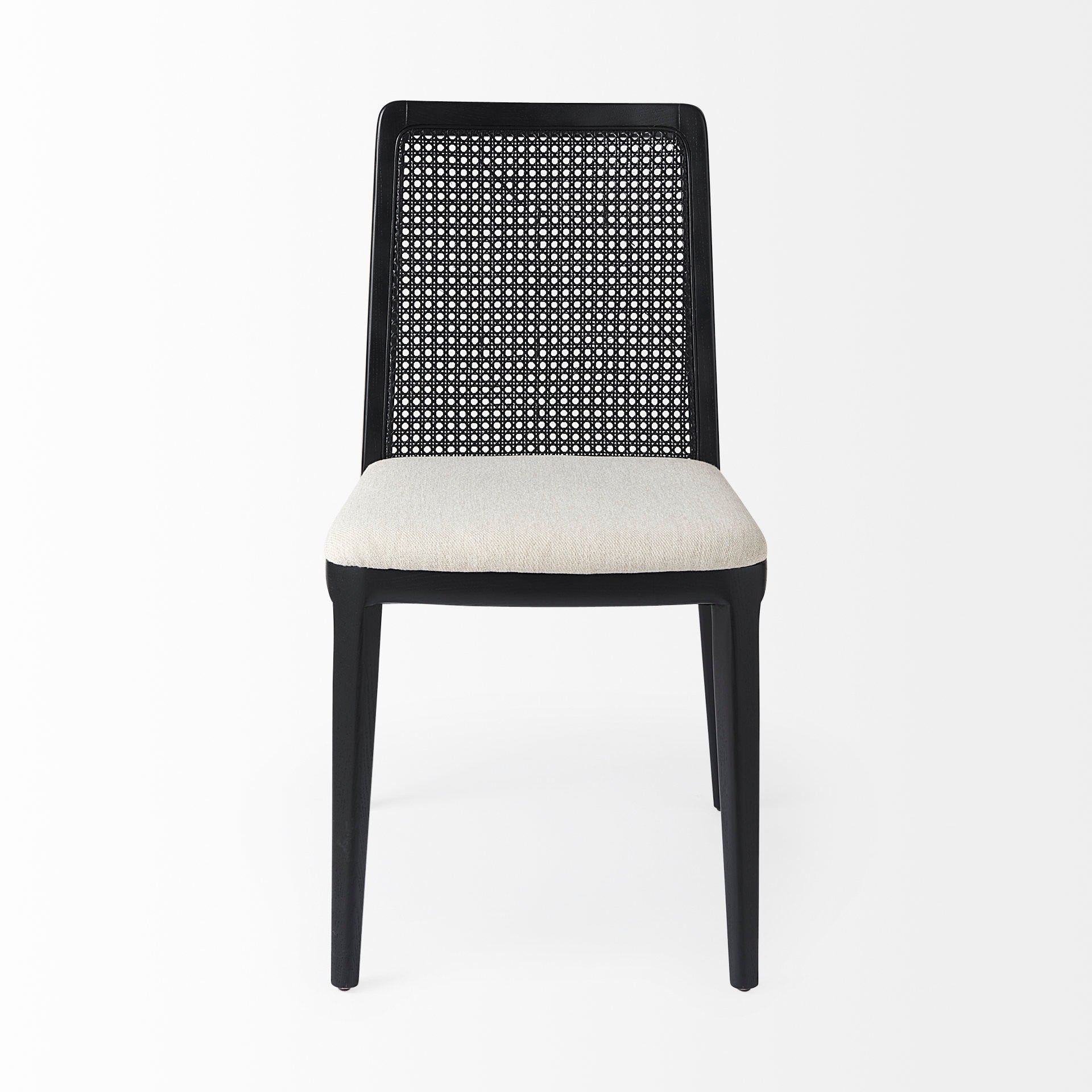 Clara Black Wood W/ Cream Fabric Seat and Cane Back Armless Dining Chair on a white background