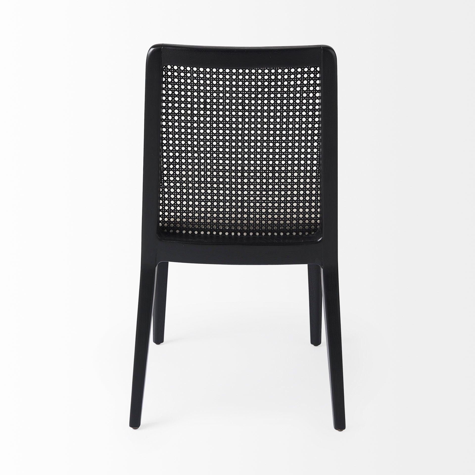 Clara Black Wood W/ Cream Fabric Seat and Cane Back Armless Dining Chair on a white background