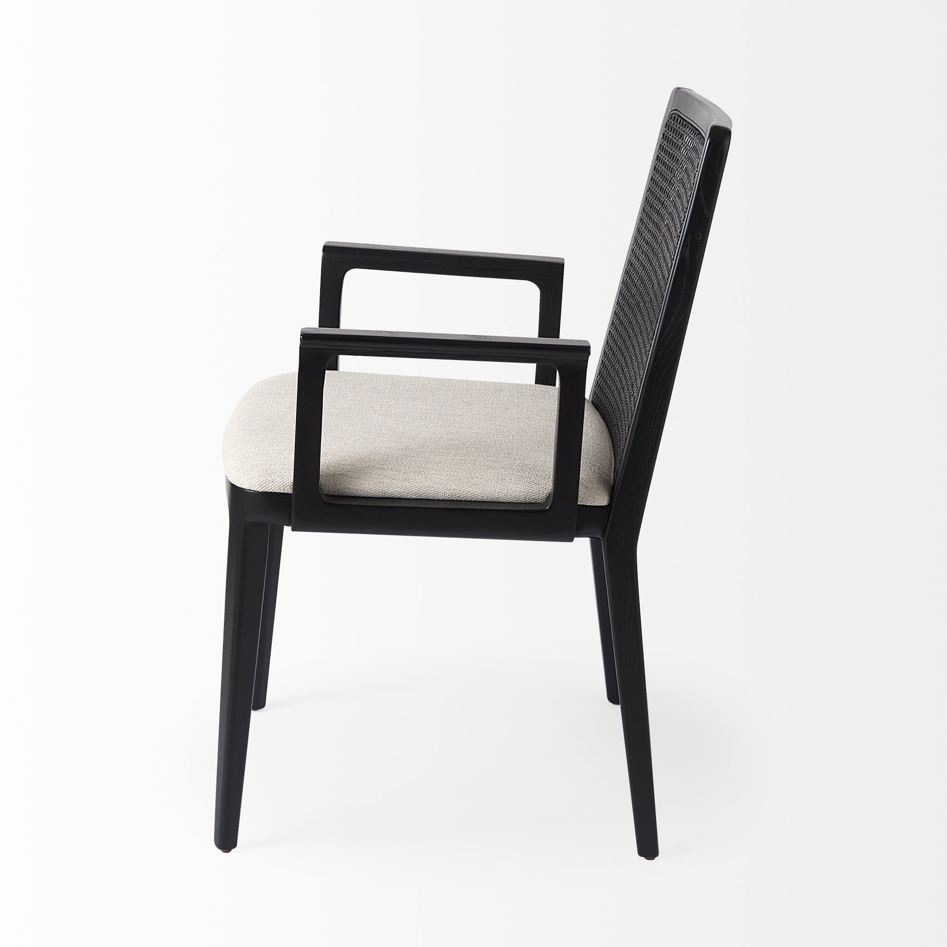 Clara Black Wood W/ Cream Fabric Seat and Cane Back Dining Chair on a white background