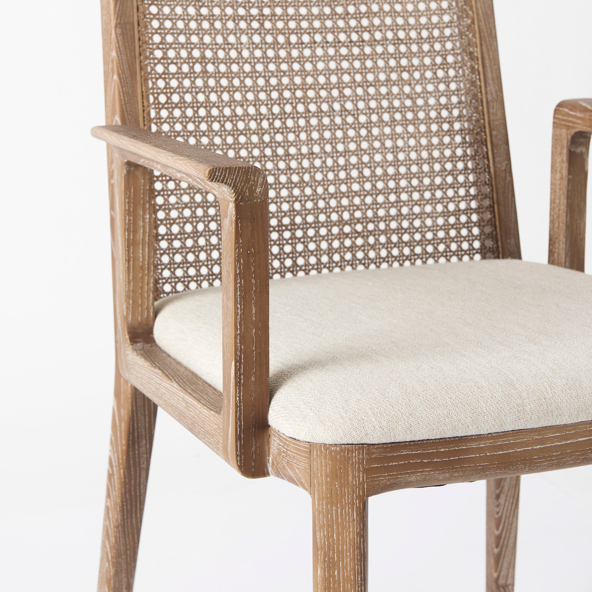 Clara Light Brown Wood W/ Cream Fabric Seat and Cane Back Dining Chair on a white background