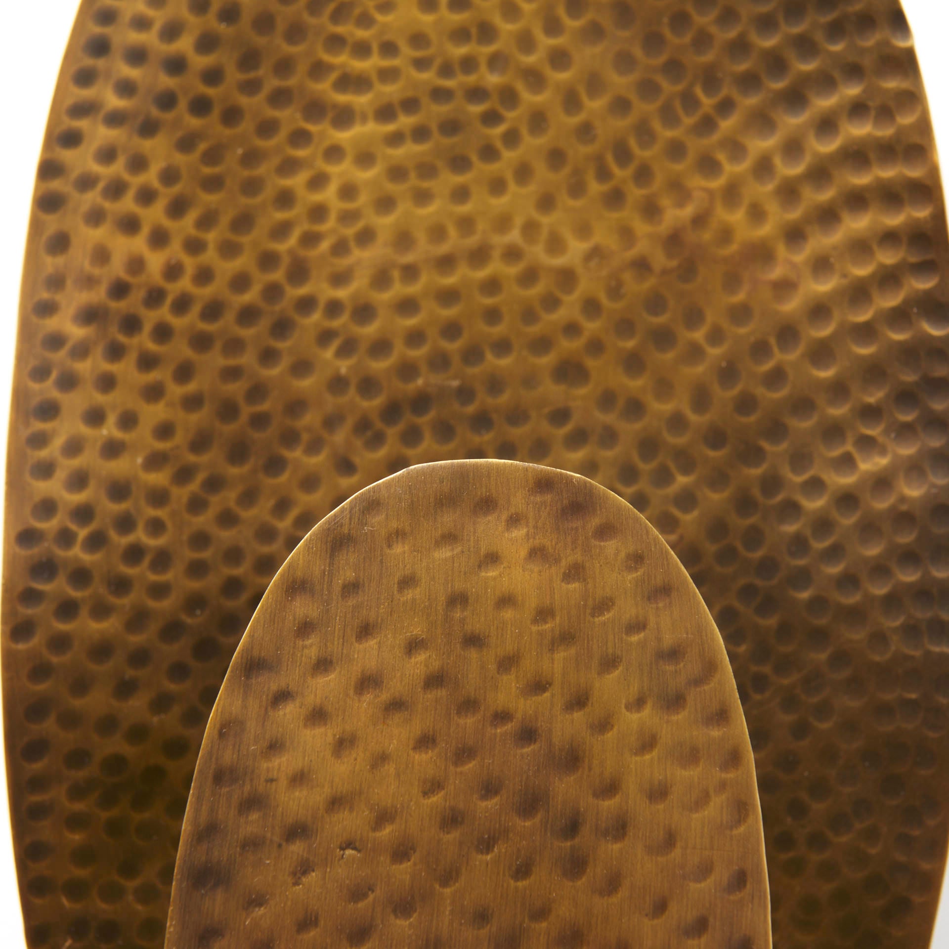 Close up of Clarence 7.0L x 5.3W x 17.0H Metal Hammered Gold Round Wall Sconce on a white background