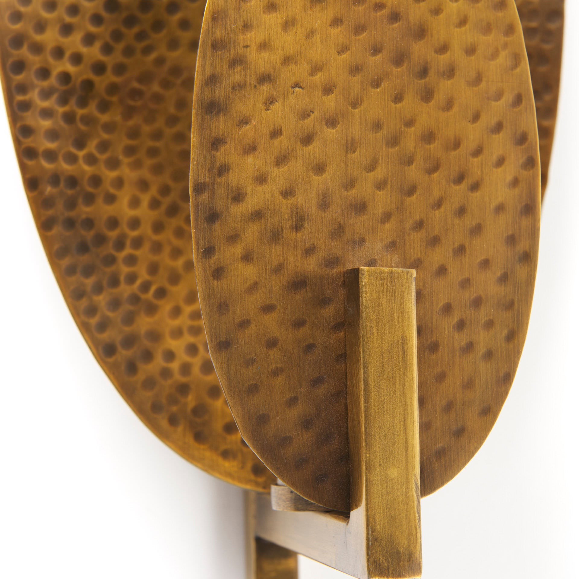 Close up of Clarence 7.0L x 5.3W x 17.0H Metal Hammered Gold Round Wall Sconce on a white background
