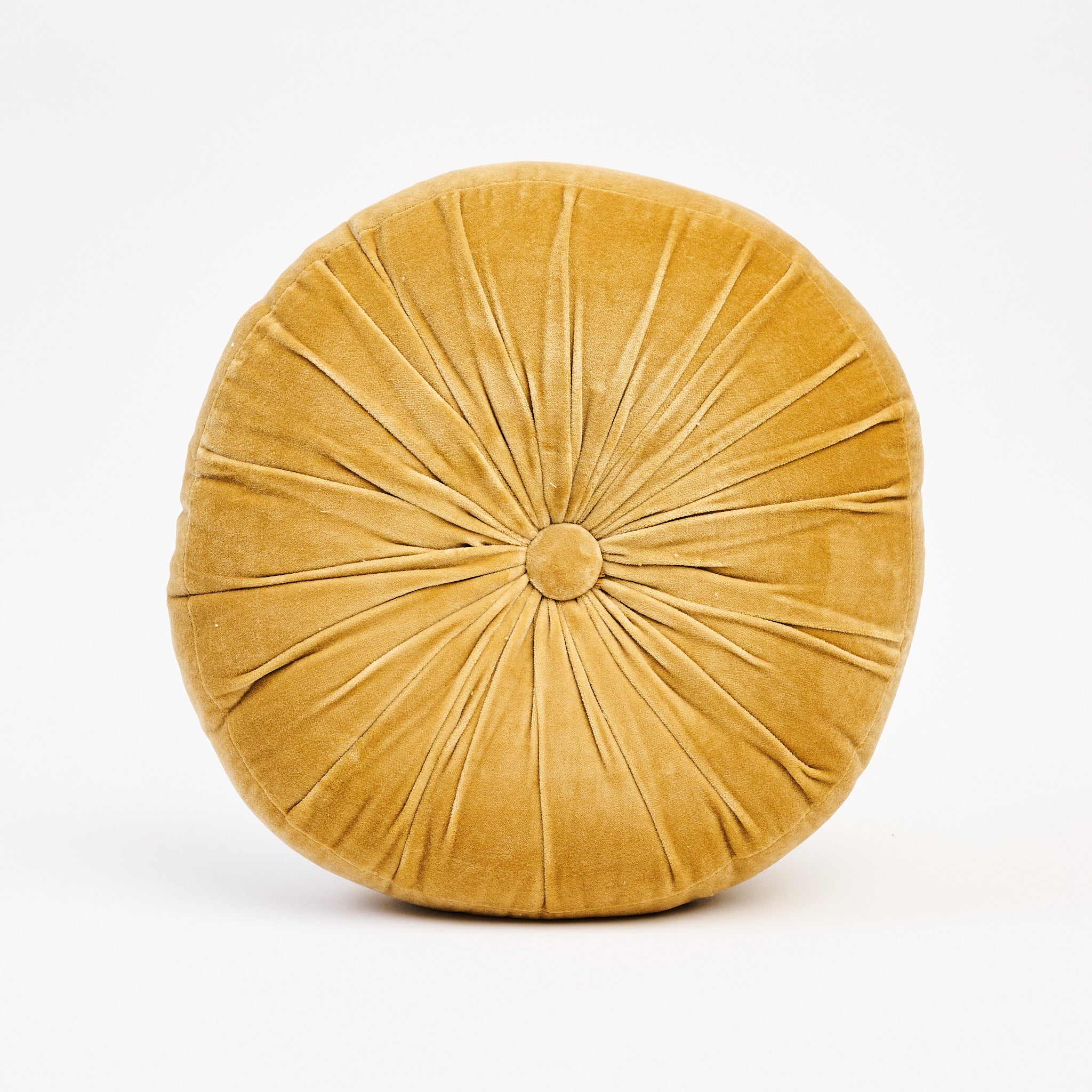 Velvet Tuft Round Cushion in Gold on a white background at Addison West