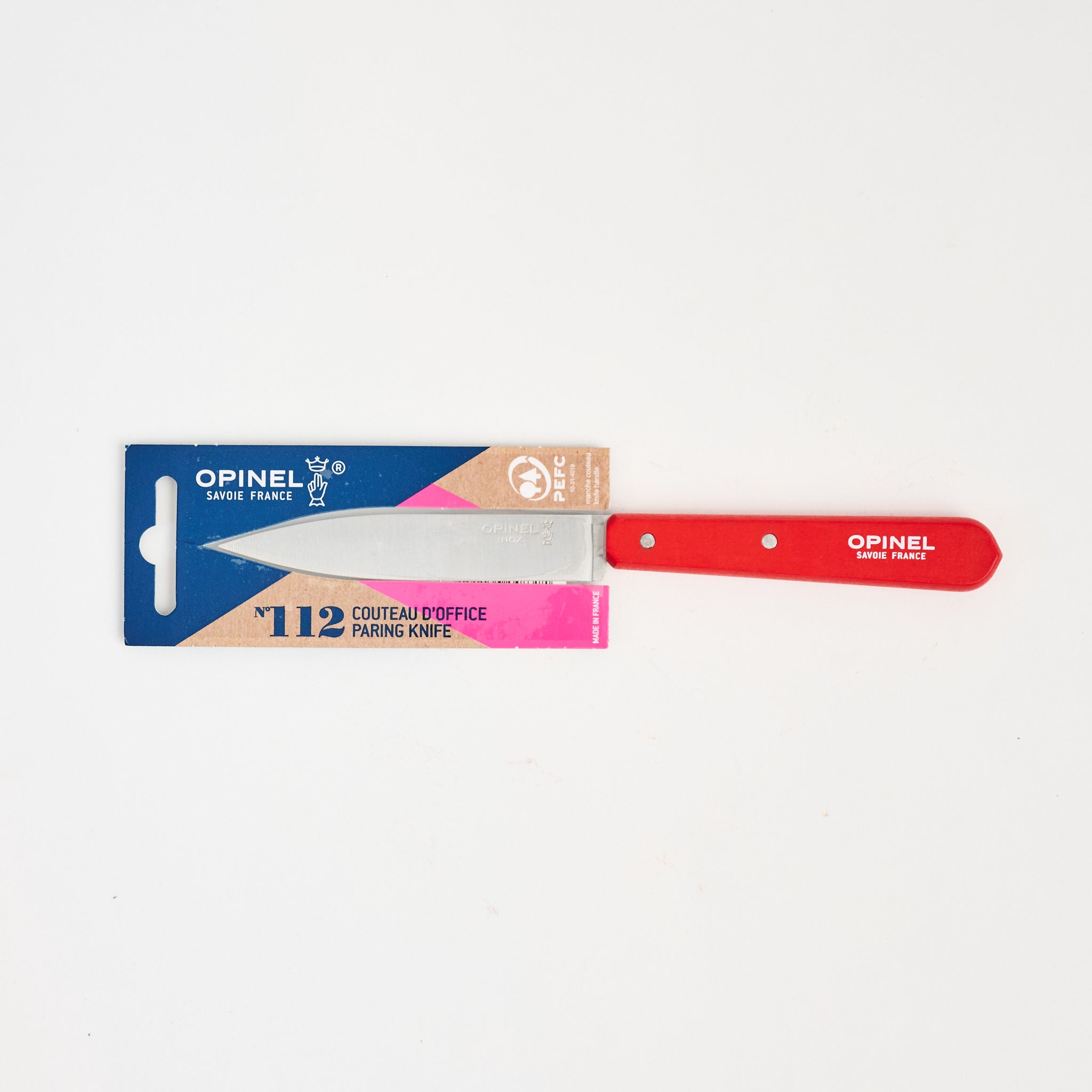 Opinel No.112 Paring Knife in Red on a white background at Addison West