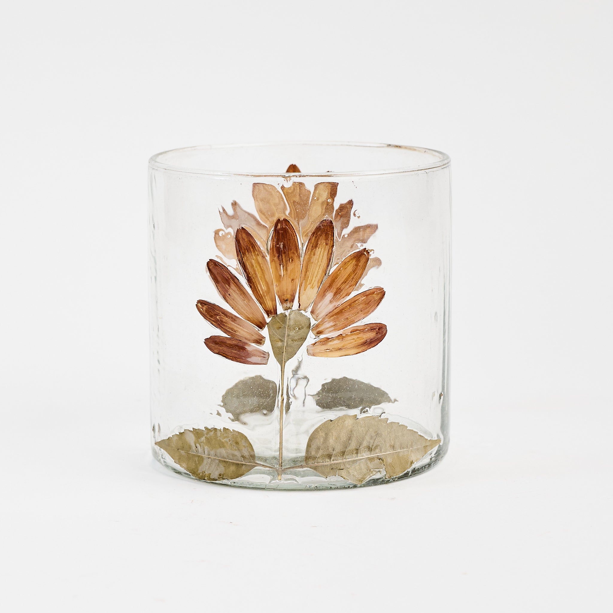 Gerber Daisy Votive on a white background at Addison West
