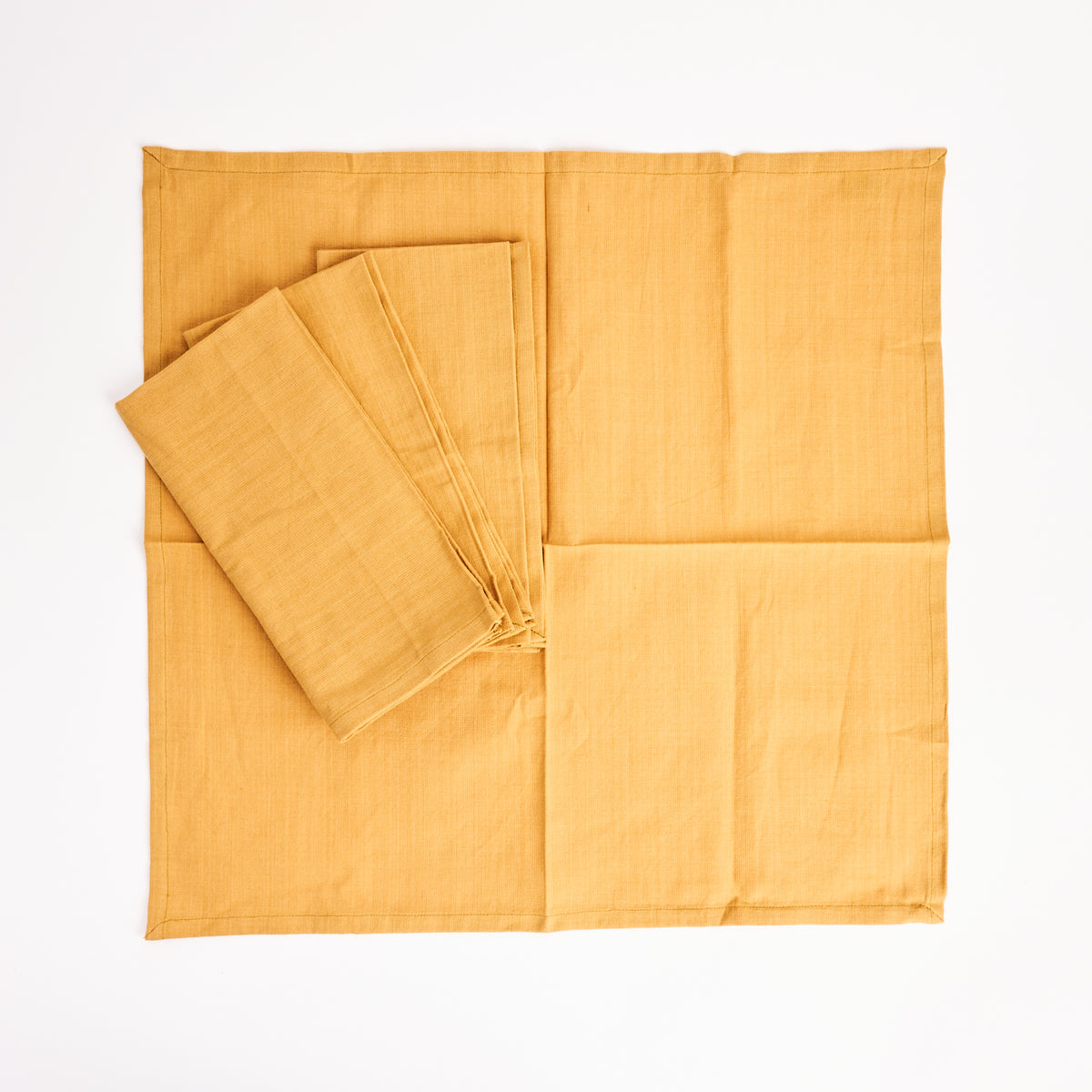 Mustard Homespun Napkins, Set of 4 on a white background at Addison West