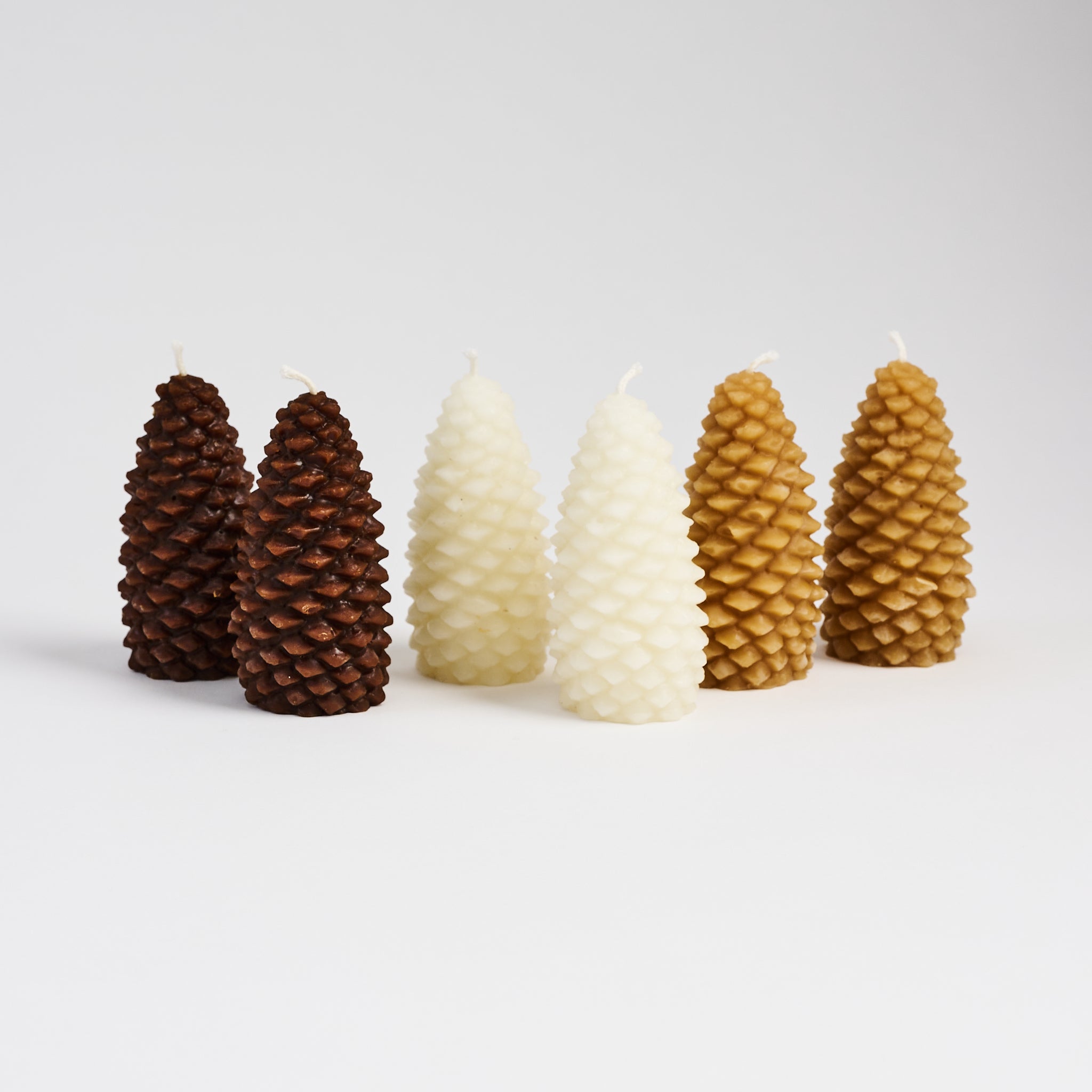 Pinecone Beeswax Candles on a white background at Addison West
