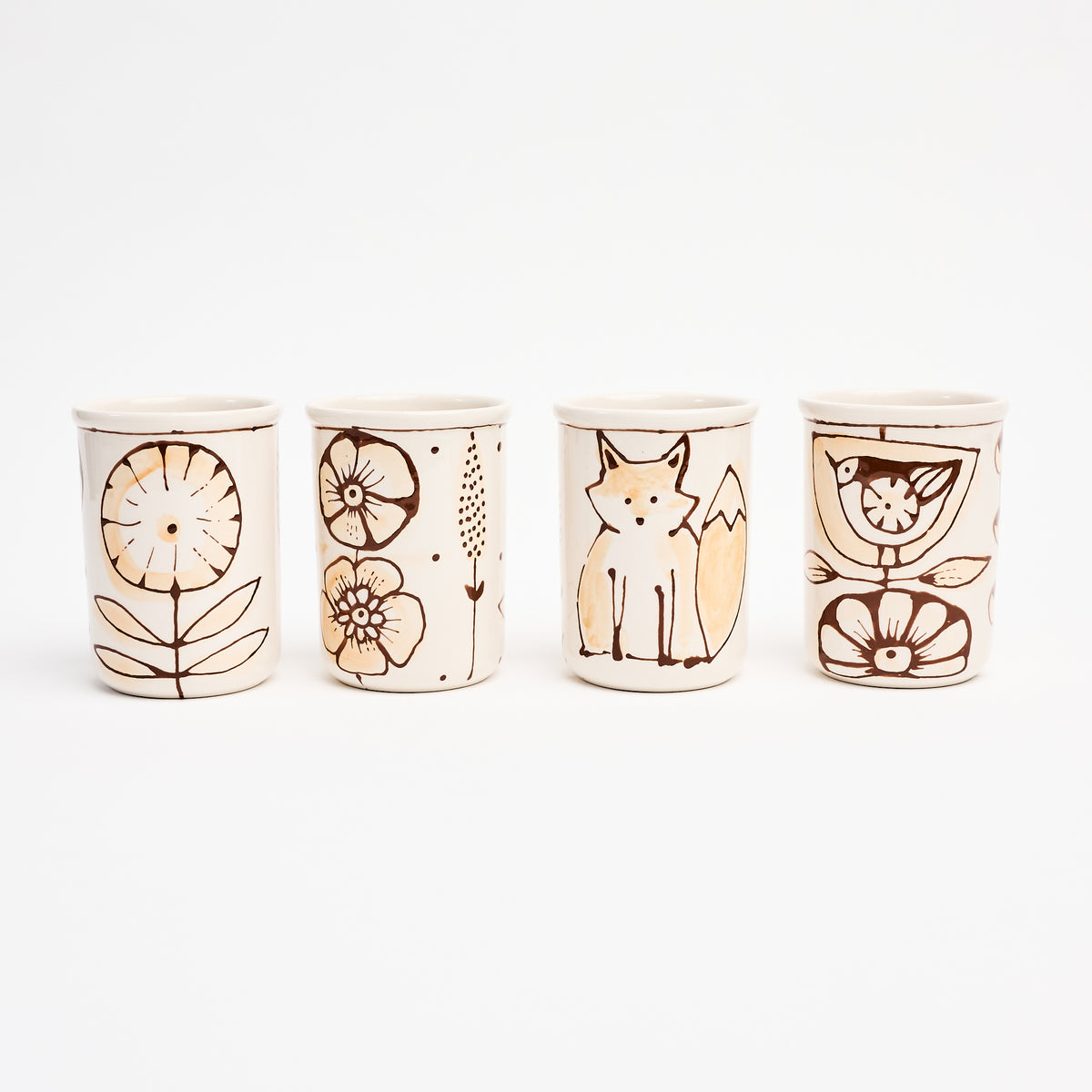 Stephanie Verdun Small Cup in Orange & Brown on a white background at Addison West