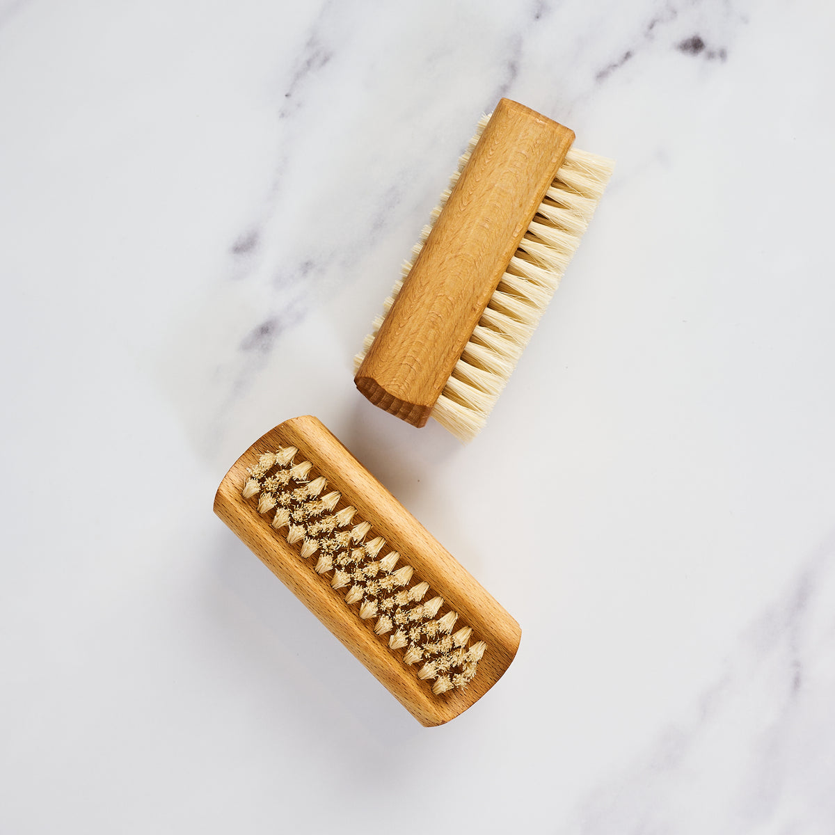 Redecker Classic Nail Brush on a marble table at Addison West