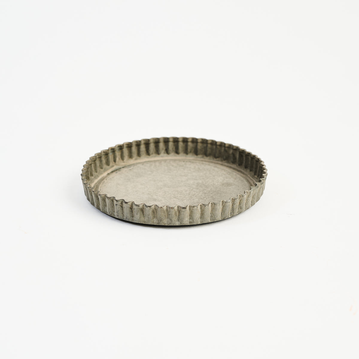 Crimped Steel Saucer on a white background at Addison West