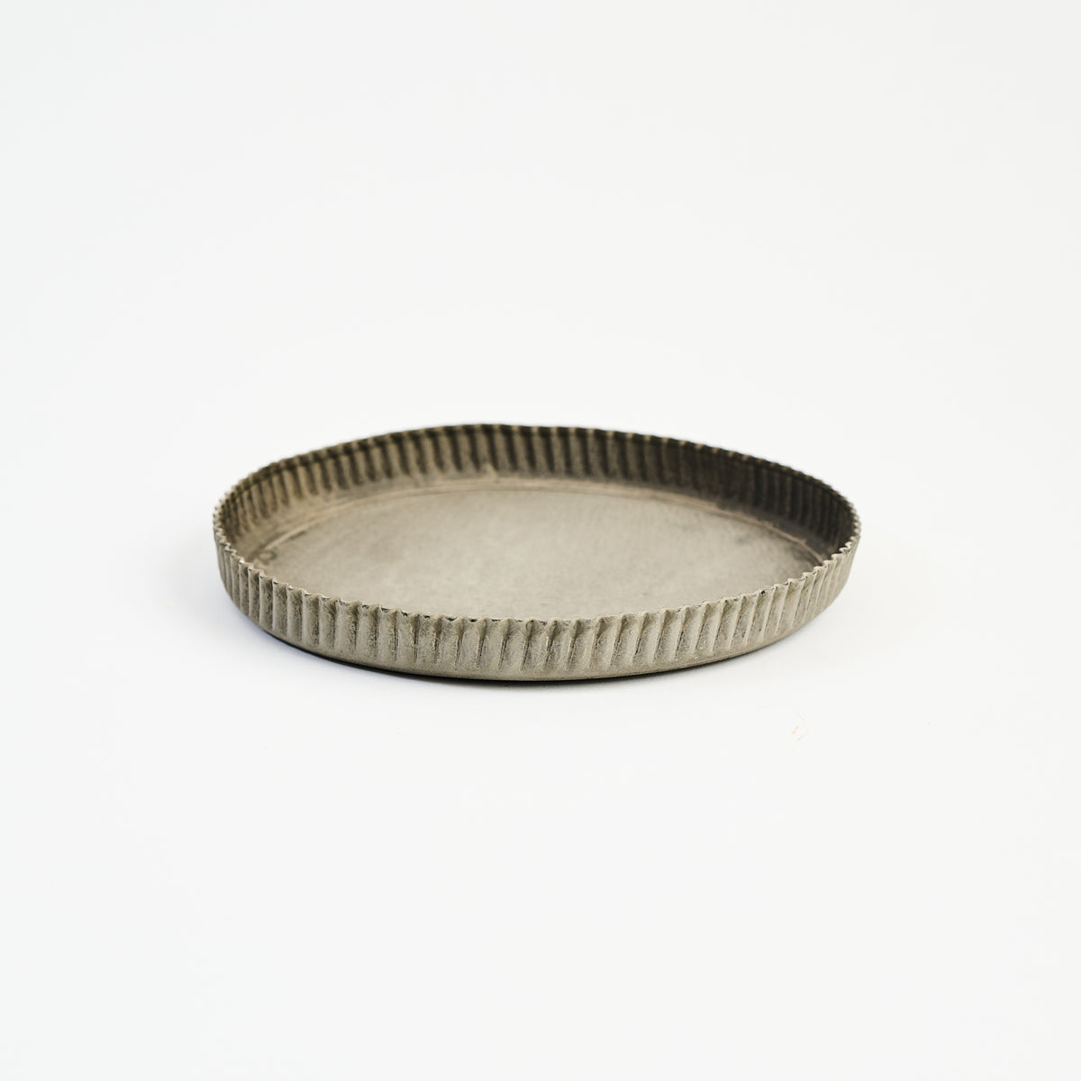 Crimped Steel Saucer on a white background at Addison West