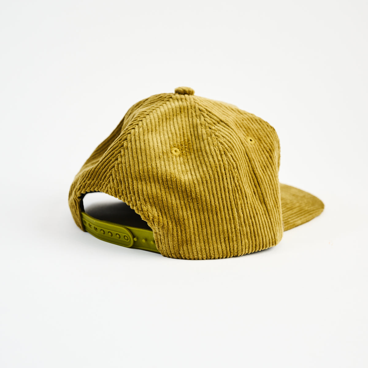Cool Bands Trucker Hat in Olive on a white background at Addison West
