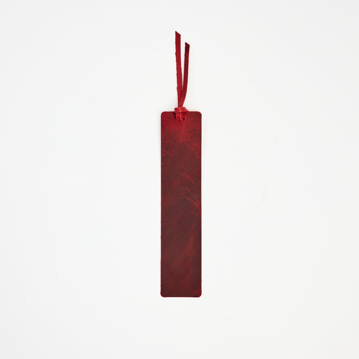 Genuine Leather Bookmark in Red on a white background at Addison West
