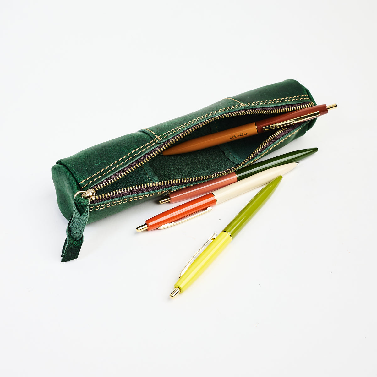 Leather Pencil Case in Green on a white background at Addison West