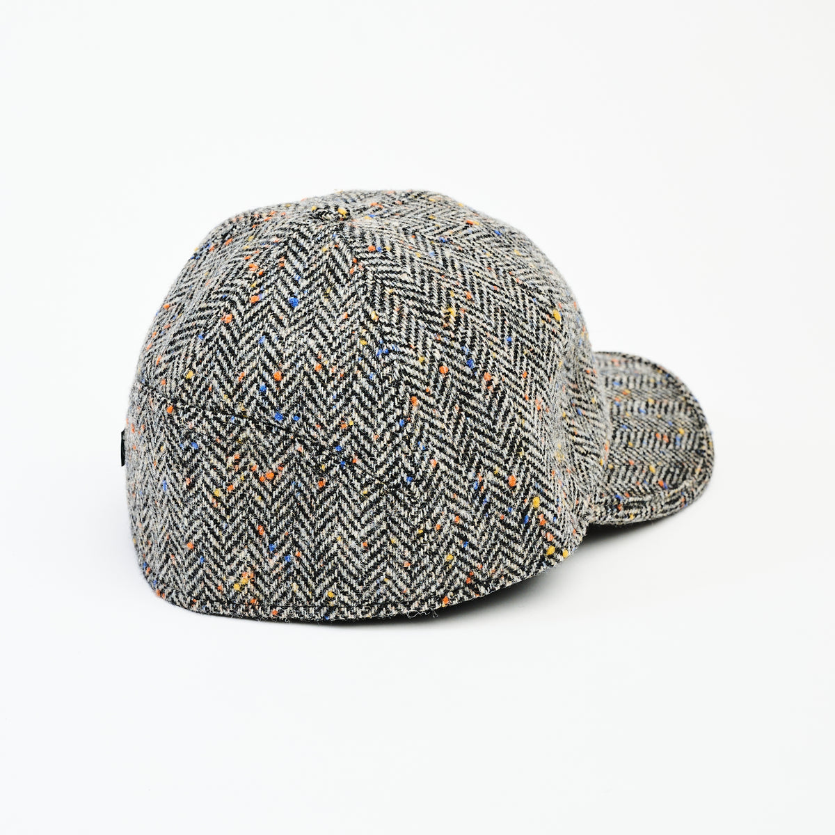 Wool Baseball Cap in Gray Herringbone on a white background at Addison West