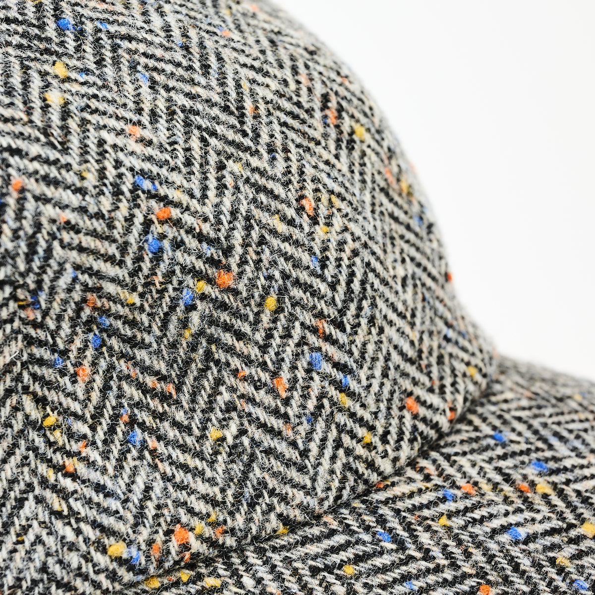 Wool Baseball Cap in Gray Herringbone on a white background at Addison West