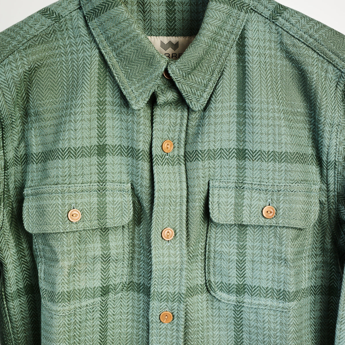 Warren Six Season Flannel in Lichen on a white background at Addison West