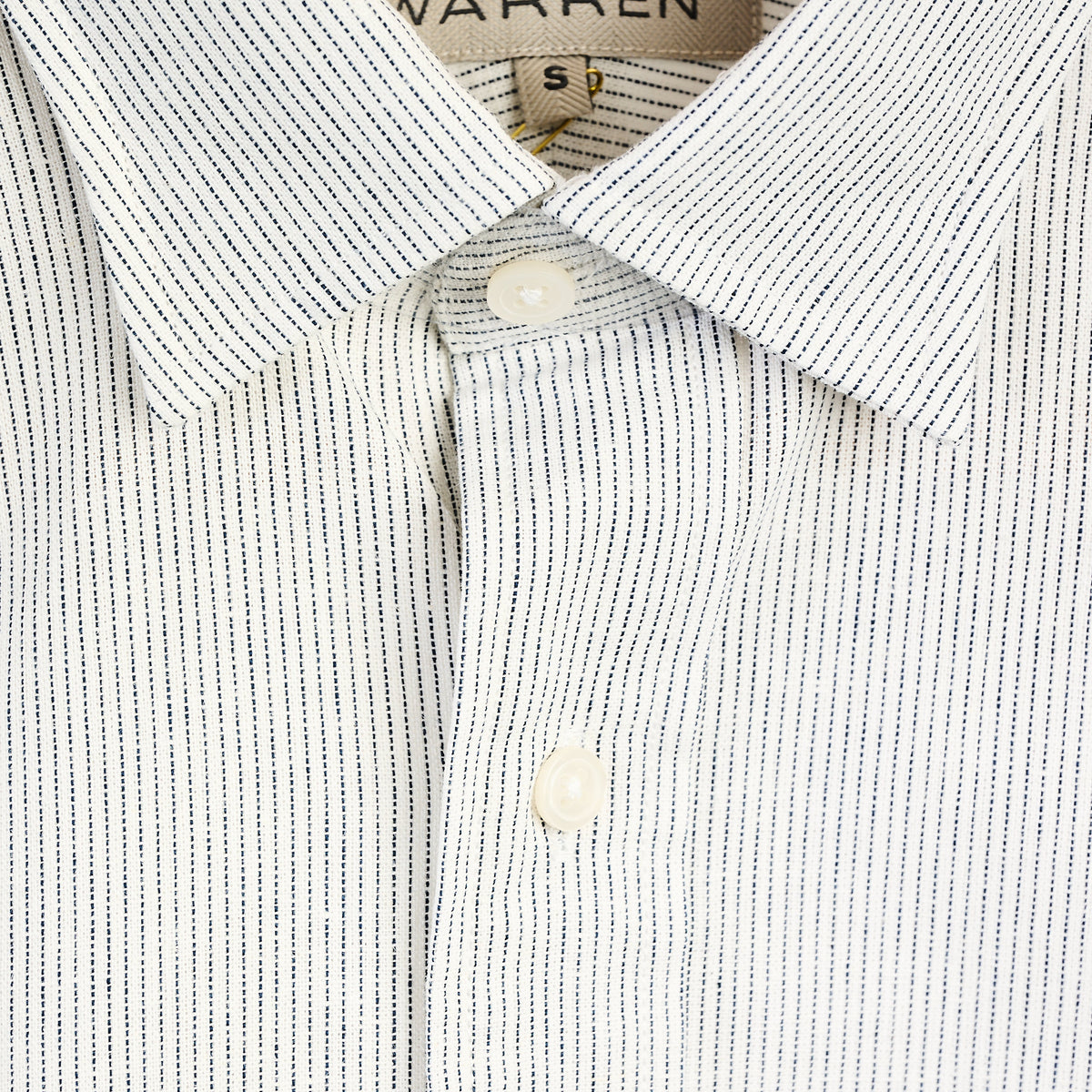Warren Windsor Button Down in White Stripe on a white background at Addison West