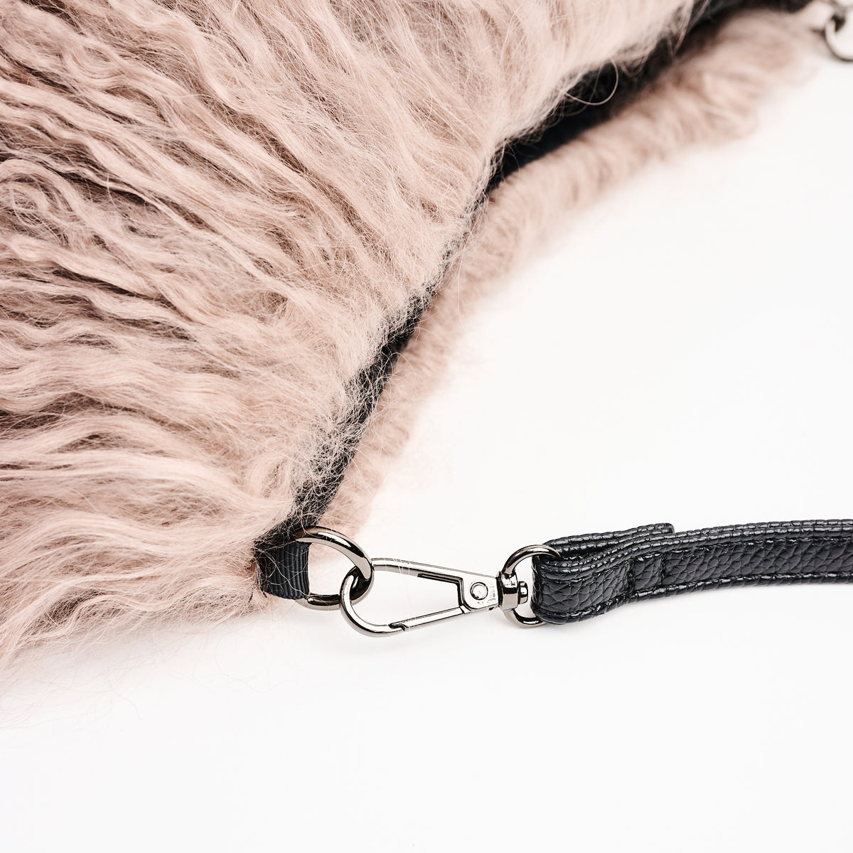 Jasmin Muff Bag in Stucco Sand on a white background at Addison West