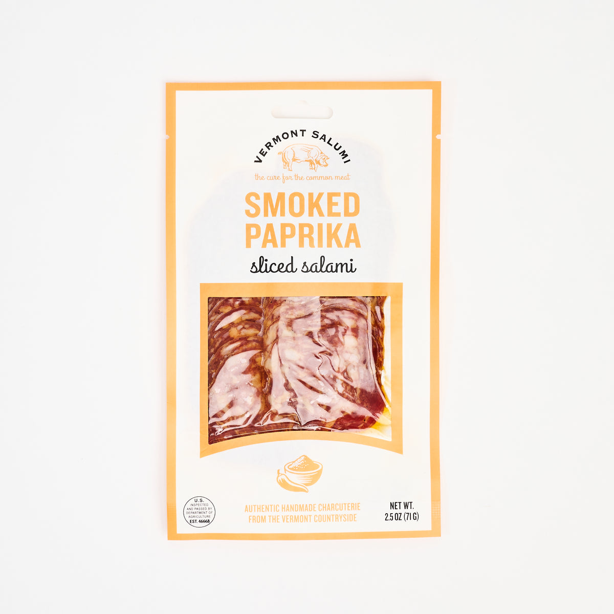 Smoked Paprika Sliced Salami on a white background at Addison West