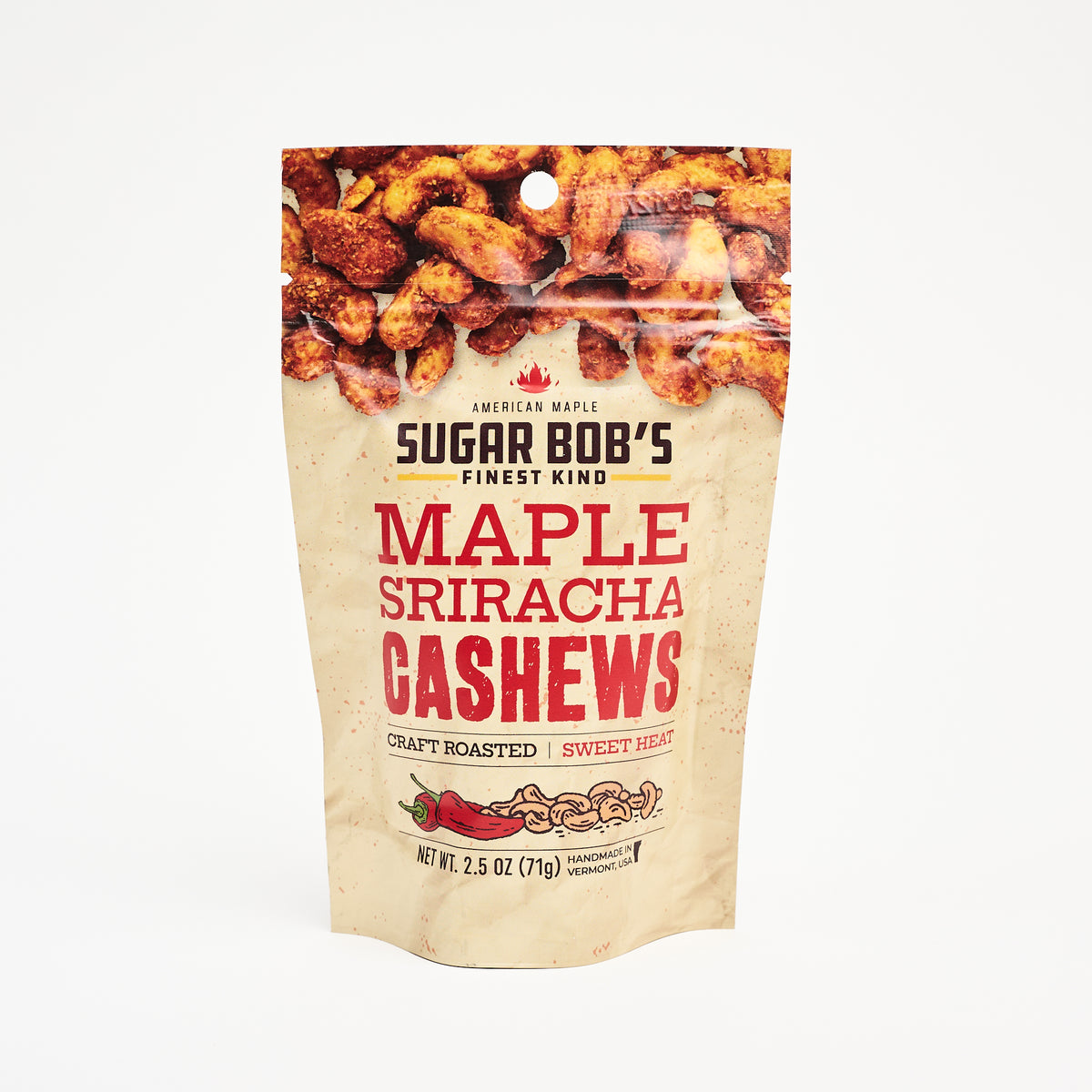 Sugar Bob's Maple Sriracha Cashews on a white background at Addison West